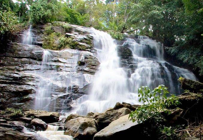 Visit Tat Mok Waterfalls and Interact with Buddhist Monks