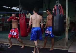 Muay Thai Boxing Training with soldier
