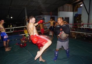 Muay Thai Boxing Training with soldier